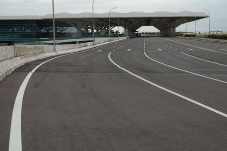 Kulonprogo, Indonesia, Dec 7, 2021. The access road to the drop off area of the second floor of Yogyakarta international airport which looks deserted.のeditorial素材