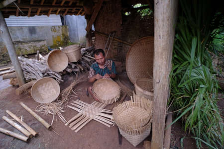 Yogyakarta, Indonesia, March 4, 2022. Bamboo craftsmen with disabilities who strive to be independent by working to make handicraft products.のeditorial素材
