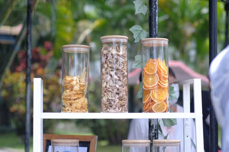 Slices of dried fruit in a jar to be consumed as a healthy snack.の写真素材