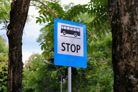 Stop sign for bus public transport on roadside.の写真素材