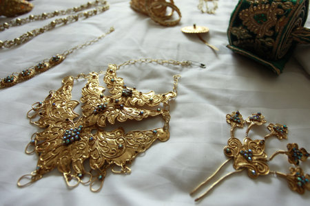 Imitation jewelry made of yellow metal worn by brides in Bugis tradition.の写真素材