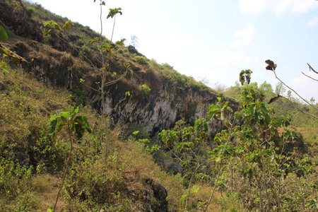 Karst rock outcrops are often found in the southern part of Yogyakarta, as part of the seismic phenomenon of fault movements within the earth.の写真素材