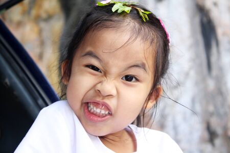 little funny girl make facesの写真素材
