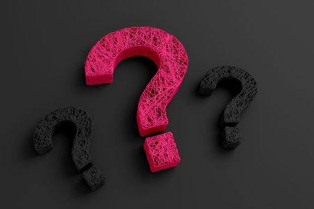 A set of thin strands twisted together in the form of three question marks on black background. 3D...