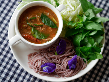 traditional thai noodle - Khanom jeen nam ya pa and vegetable noodle with herbの写真素材