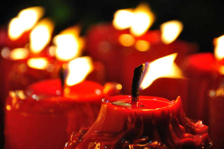 The red candle in the windの写真素材