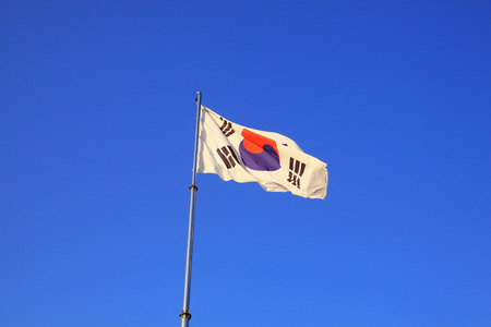 A Korean-flag blowing in the windの写真素材