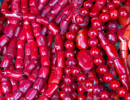 Old red coral necklaces and beads at the market of the old Jerusalem cityの写真素材