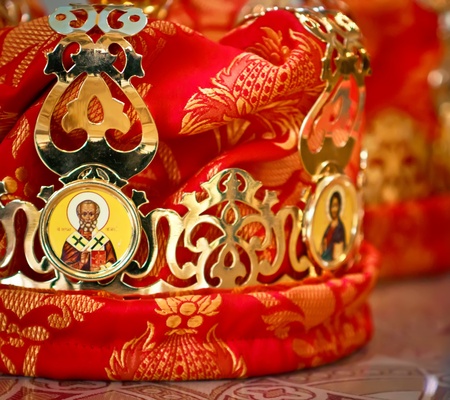 Wedding crown which  puts on the heads of bride and bridegroom by the priest durring wedding ceremony in the christian orthodox churchの写真素材