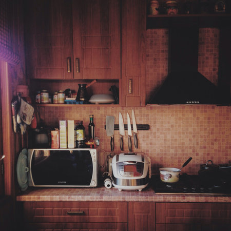 Kitchen view in a country-house in evening light