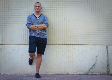 Portratit of handsome man in stripped sweater full lenghのeditorial素材