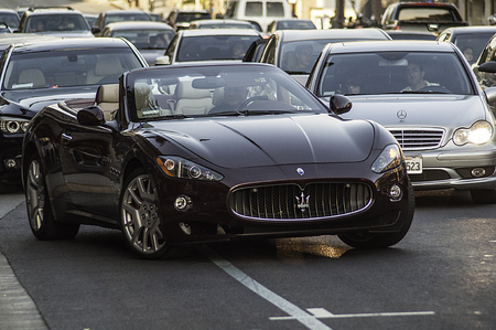 Maserati convertible pulling out into traffic in Los Angelesのeditorial素材