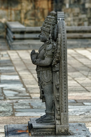 Statue of a Garuda vehicle of God Vishnu at Chennakeshava Temple Belur District Hassan State...