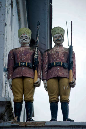 Statue of a two Gard or doorkeeper with Gun in hand at Phaltan district Satara state Maharashtra India 03 12 2010のeditorial素材