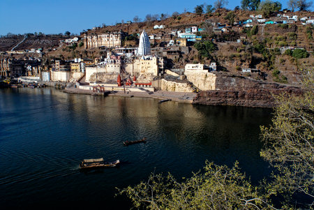 Omkareshwar ghat and the temple of Jyothirlingam one of the 12 throughout India on the bank of Narmada river district Khandva state Madhya Pradesh India 02 08 2007のeditorial素材