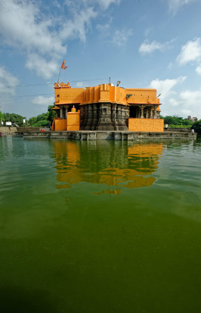 Hindu temple of God Shiva Kankaleshwar Mandir (Temple) in a lake at Beed state Maharashtra India 09...