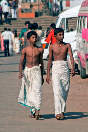 Two young devotee in front of Anantha Padmanabha swamy Temple at Trivandrum or Thiruvananthapuram state Kerala India 01 25 2010のeditorial素材