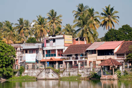 Residential houses near pond of Anantha Padmanabha swamy Temple at Trivandrum or Thiruvananthapuram state Kerala India 01 25 2010のeditorial素材