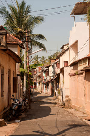 Residential houses and narrow lanes in city Thiruvananthapuram state Kerala India 01 25 2010のeditorial素材