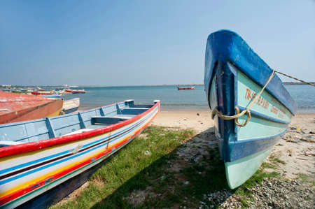 Parked fishing boats on Thangasseri beach at Kollam state Kerala India 01 29 2010のeditorial素材