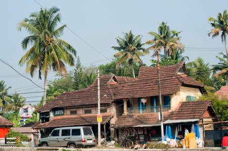 Traditional tiled roof houses and shops at Alappuzha state Kerala India 02 02 2010のeditorial素材