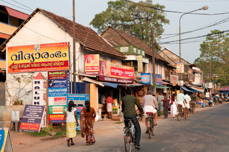 Traditional tiled roof houses and shops on market road of Alappuzha state Kerala India 02 02 2010のeditorial素材
