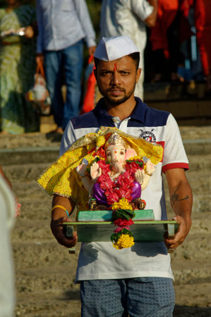 Procession of God Ganesh festival in Mumbai state Maharashtra india 09 17 2018のeditorial素材