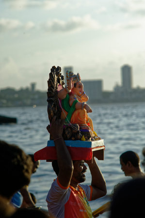 Immersion of elephant headed God Ganpati (Ganesha) in Arabian Sea at Mumbai state Maharashtra India 09 17 2018のeditorial素材