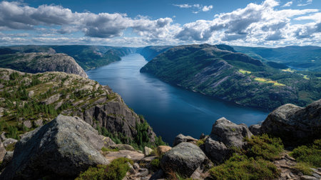A photograph of Scandinavian fjords 390 with fjord valley viewpoint, scattered fjord boulders,...
