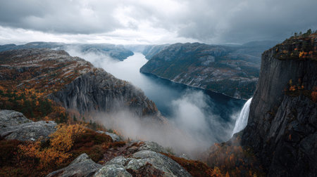 A photograph of Scandinavian fjords 396 with fjord peninsula viewpoint, waterfall mist, colorful...