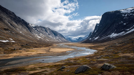 A photograph of Scandinavian fjords 420 with fjord valley with winding fjord waters, sparse tundra...