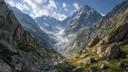 A photograph of Alpine mountains 282 with alpine glacier valley, rocky mountain outcrops, green...
