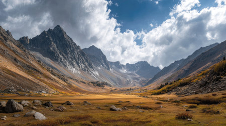 A photograph of Alpine mountains 449 with alpine meadow valley, glacial rocks, golden alpine autumn, ultra realistic landscape photography, wide angle lens, natural colors, clean composition, no peopleの写真素材