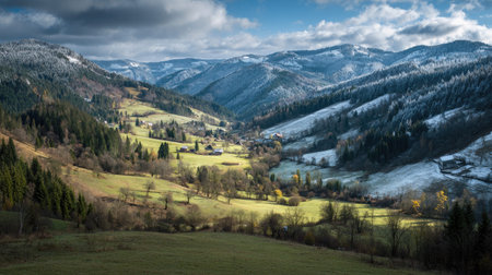 A photograph of Central European countryside with rural valley surrounded by forests, grassy meadow...
