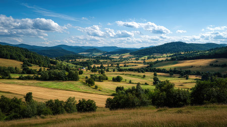 A photograph of Central European countryside with countryside valley landscape, scattered...