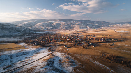 A photograph of Eastern European plains 202 with open plains with small villages, golden wheat fields, snowy eastern european winter, ultra realistic landscape photography, wide angle lens, natural colors, clean composition, no peopleの写真素材