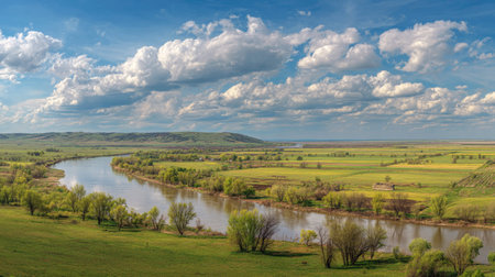 A photograph of Eastern European plains 450 with rural plains with riverbanks, rural hedgerows, fresh steppe spring, ultra realistic landscape photography, wide angle lens, natural colors, clean composition, no peopleの写真素材