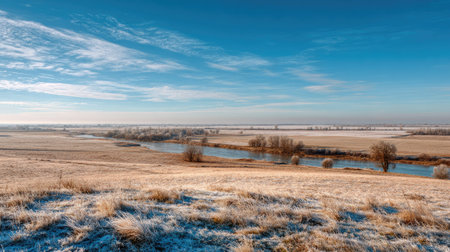 A photograph of Eastern European plains 443 with rural plains with riverbanks, sunlit grass fields,...