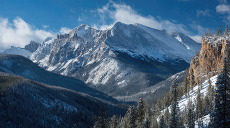 A photograph of Rocky Mountains wilderness 128 with rocky mountain ridge overlooking valley, spruce...