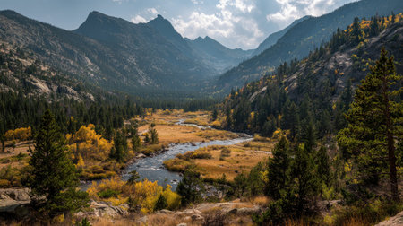 A photograph of Rocky Mountains wilderness with rocky mountain valley and winding river, pine forest...