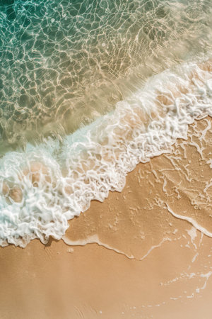 Crystal clear water rolls onto a sandy beach, creating frothy waves under the bright daylight. Vertical background. Generative AIの素材