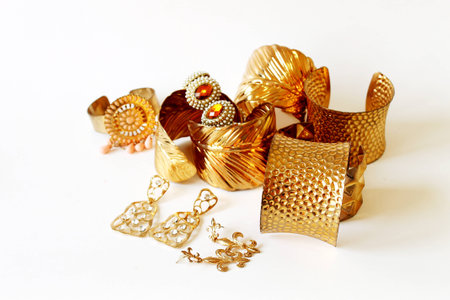 golden bracelet on white backgroundの写真素材