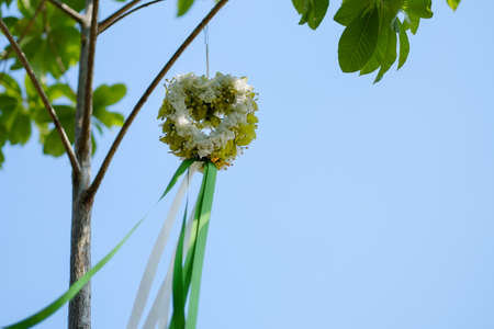 Bouquet flower hang on the tree.の写真素材