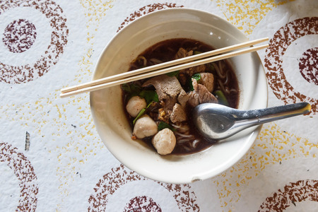 The black noodle in the bowl,Thailand food.の写真素材