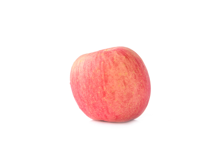 The "FUJI" apple isolated on white background.After clean it's with waterの写真素材