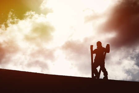 Skier is skiing against the sunset. Silhouette. Bigwood ski resort.の写真素材