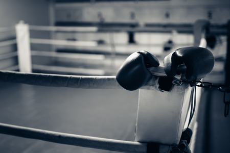 Boxing gloves in the ring. hign contrast and monochrome color tone. Toning.の写真素材