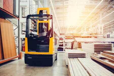 Building materials warehouse, logistics concept, construction of houses, loader.の写真素材
