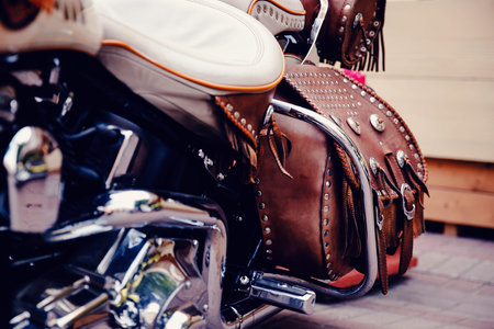 Leather bag for motorcycles. Concept travel with pleasure on a motorcycle.