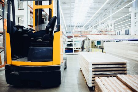 Building materials warehouse, logistics concept, construction of houses, loader.の写真素材